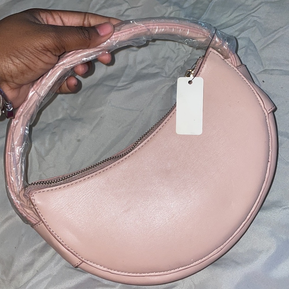 Circle handle clutch pink